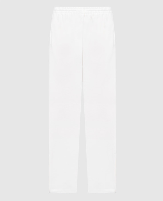 Белые брюки с молниями в боковых швах