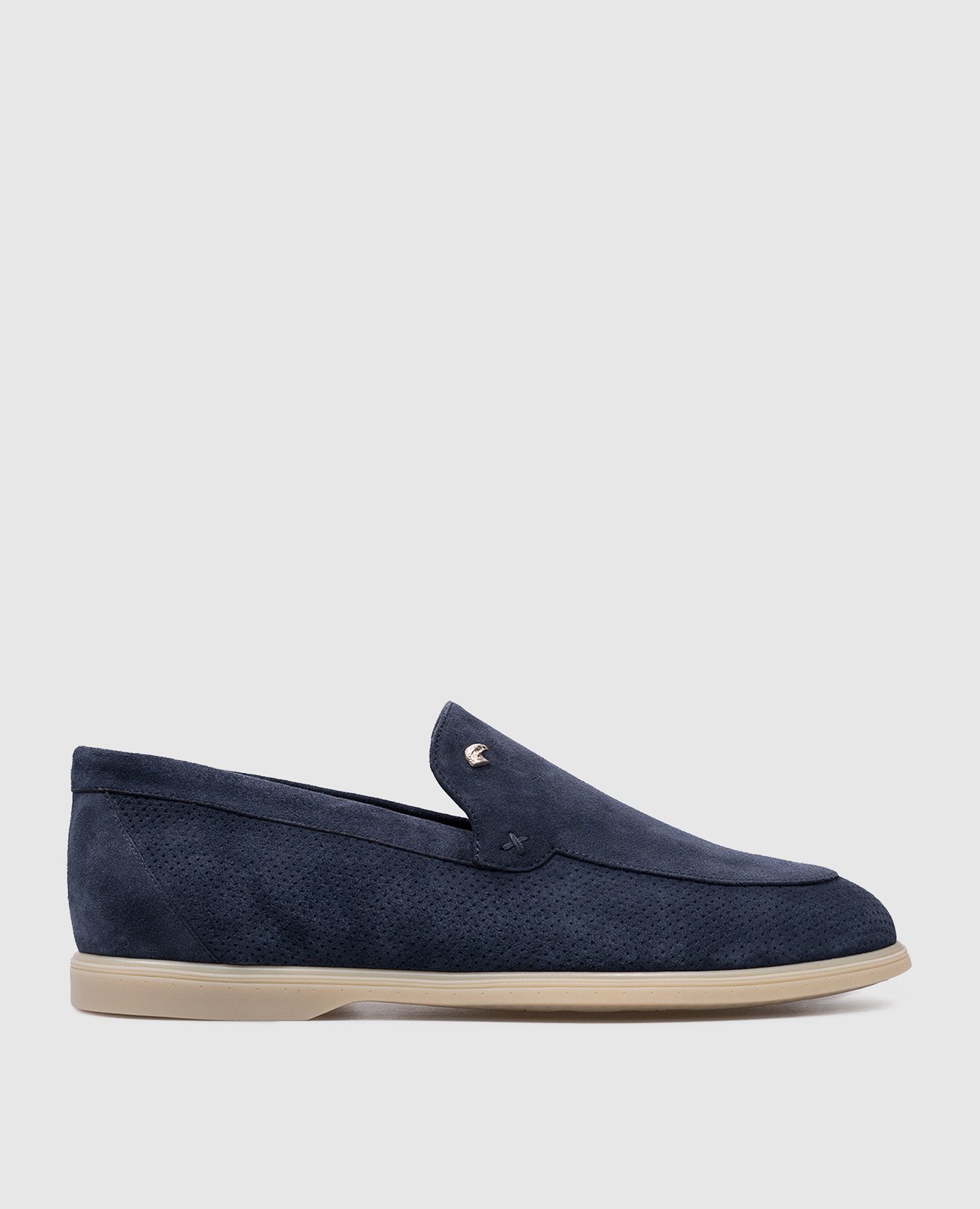 Blue suede loafers with metal logo