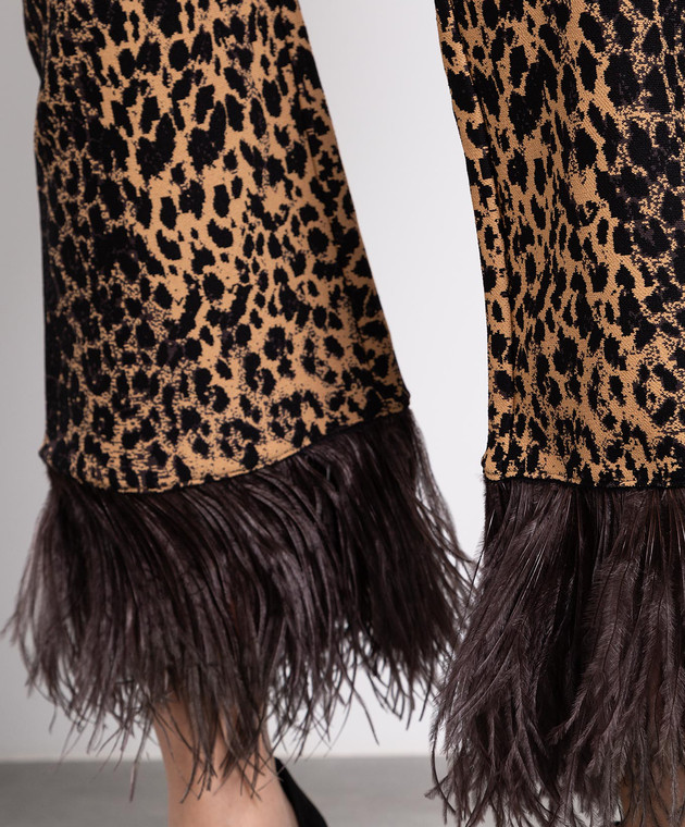 Brown animal print flared pants with ostrich feathers