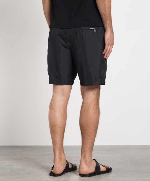 Dolce&Gabbana Black swim shorts with metallic DG logo M4E27TFUSFW изображение 4