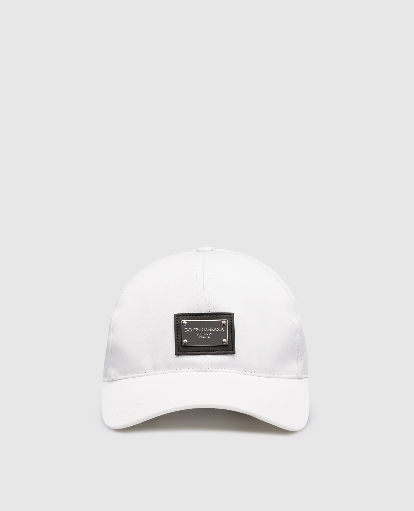 White cap with metal logo